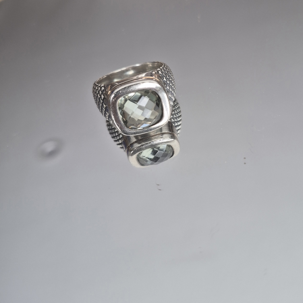 Elegant Silver-Toned Ring with Faceted Gemstone